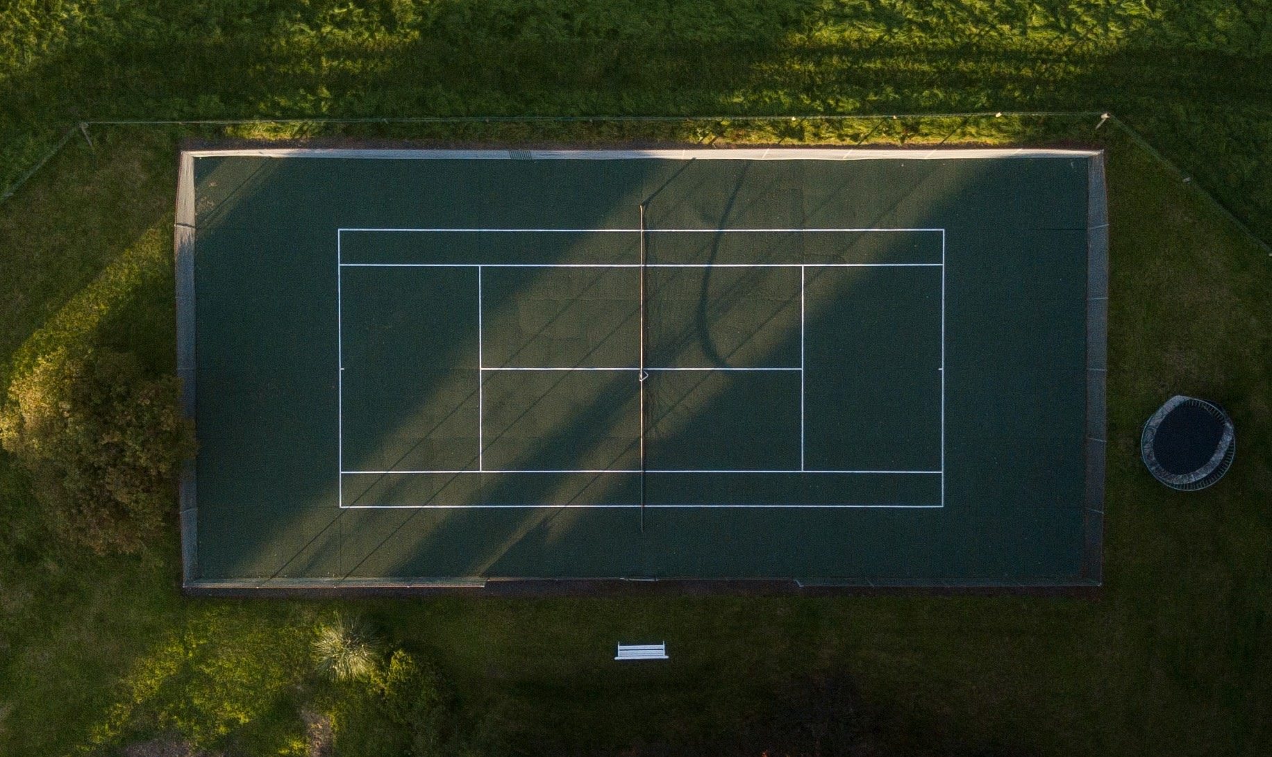Seasyde-house-tennis-court-garden